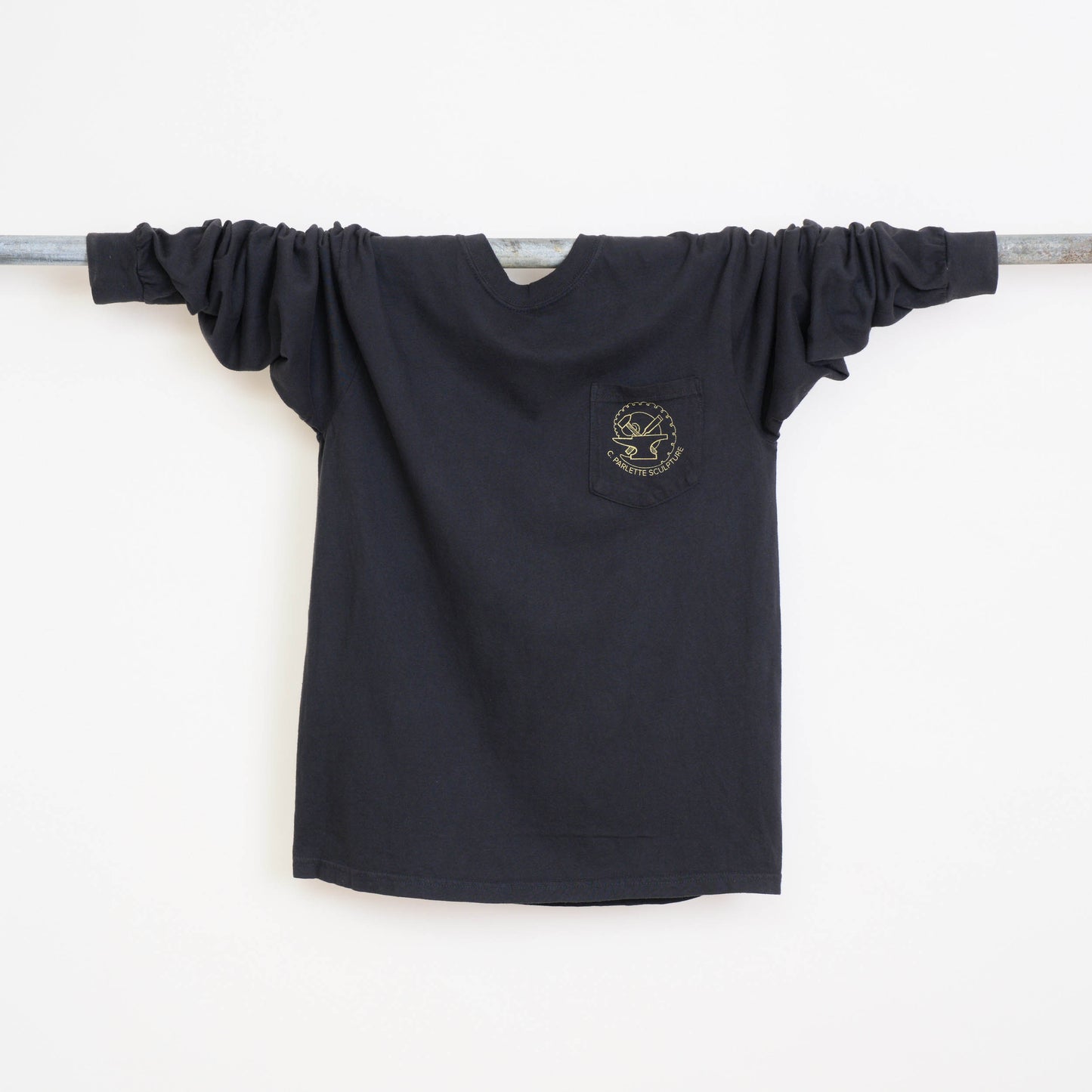 Black long-sleeve shirt with a logo on a white background.