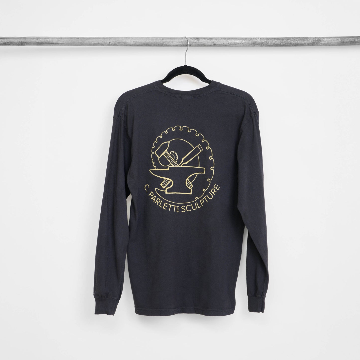 Back view of a black long-sleeve shirt with front logo printed larger in the middle.